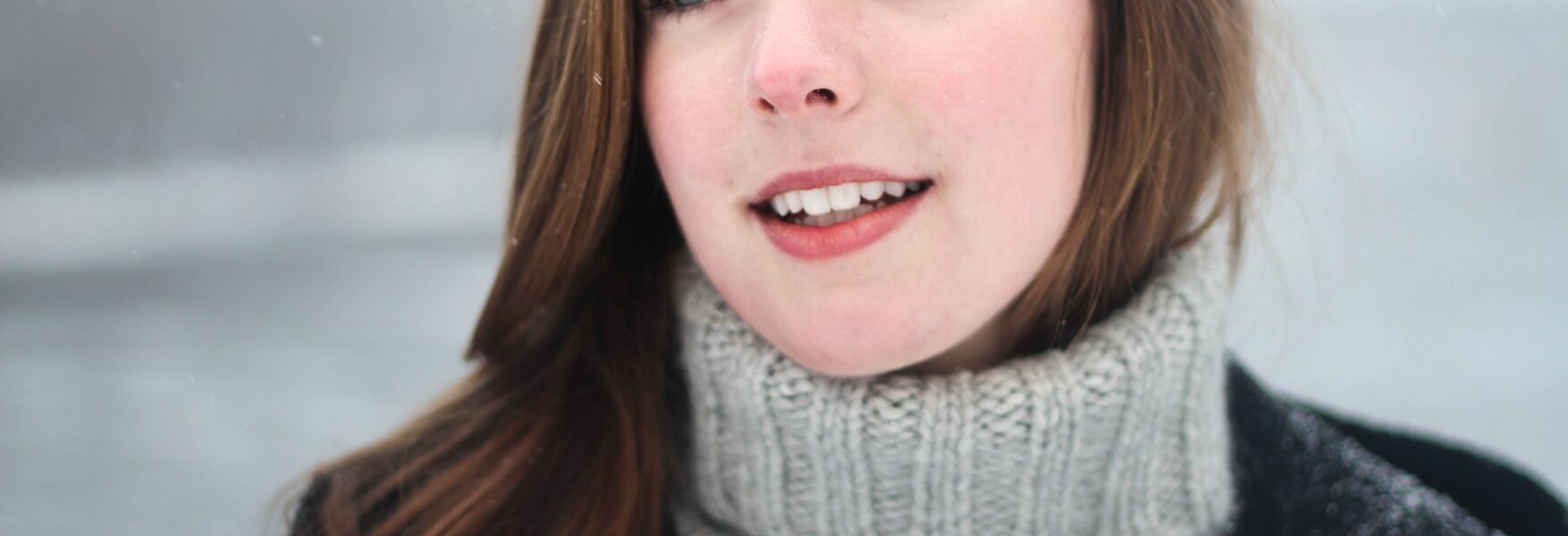woman in sweater outside